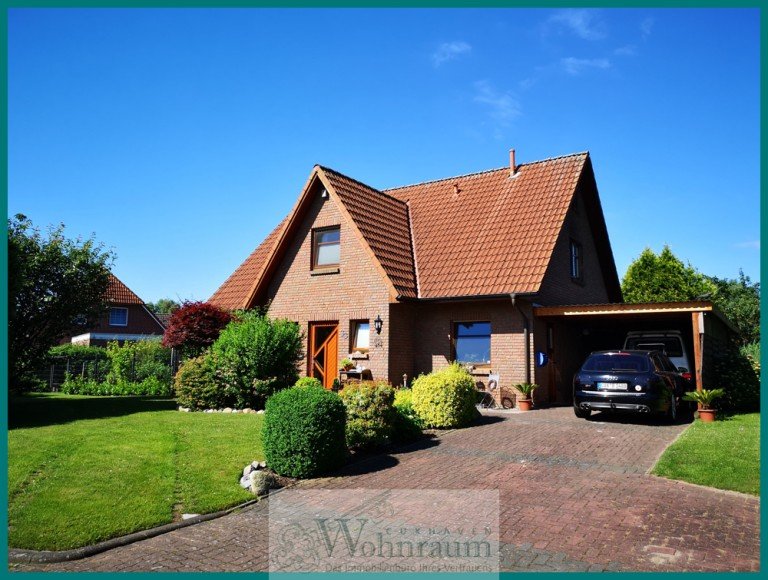 Stra�enansicht Neuhaus (Oste) Einfamilienhaus Top gepflegtes Friesenhaus mit tollem Garten direkt an der Aue.