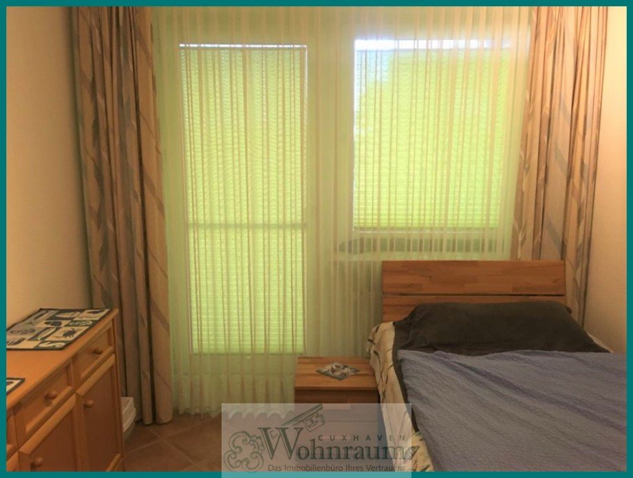Schlafzimmer mit Zugang zur Terrasse Erdgeschosswohnung Cuxhaven