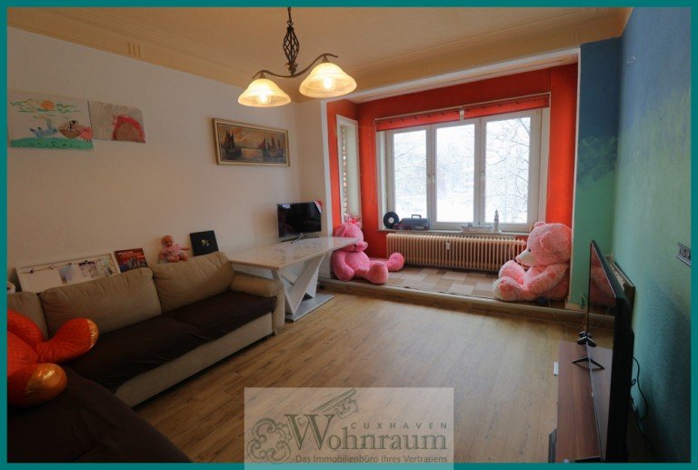 Wohnzimmer Cuxhaven Etagenwohnung Eigentumswohnung, Renditestark, ideal zur Kapitalanlage!