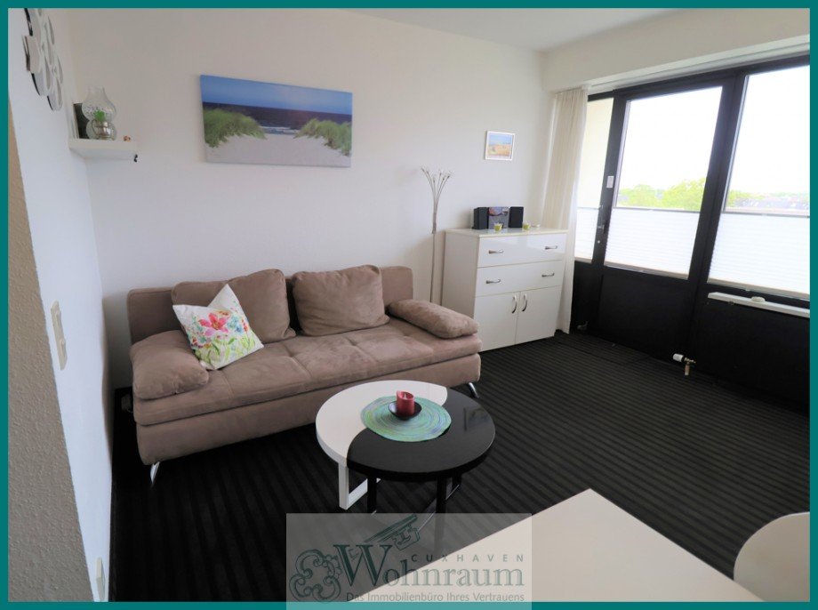 Wohnzimmer mit neuem Sofa Etagenwohnung Cuxhaven / D�se