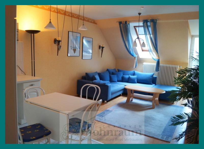 Wohnzimmer mit Zugang zum Balkon Etagenwohnung Cuxhaven